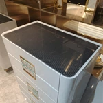 High-Gloss White Tall Sideboard Cabinet with Five Drawers Green Stone Inlay Pulls Rounded Corners and Gold-Tone Stainless Steel Base
